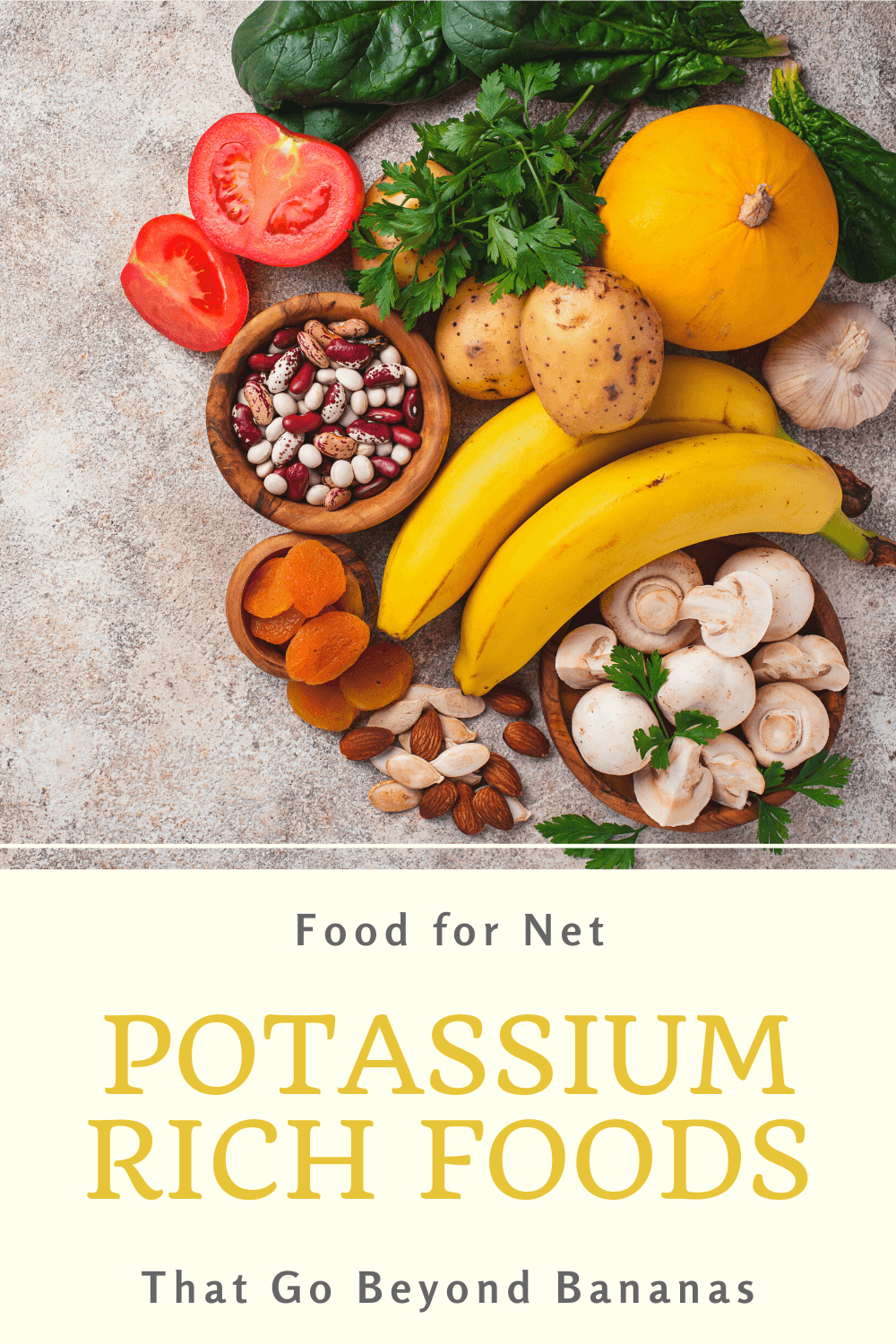 A selection of potassium rich foods on a table including options like bananas, spinach and the like.