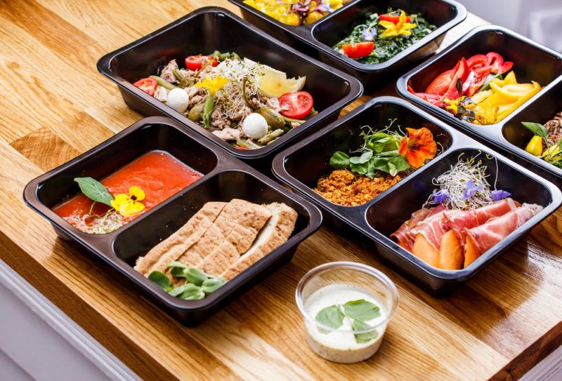 A selection of cooked meals in plastic containers