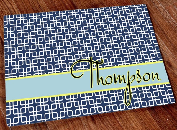 Preppy-Glass-Cutting-Board | Food For Net Blue and yellow cutting board with the name Thompson written on it.