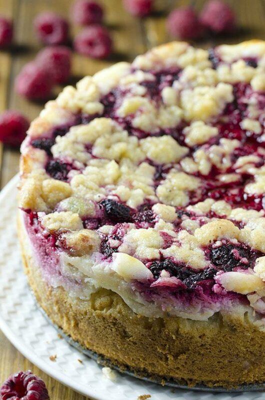 A large plate with a raspberry cream coffee cake