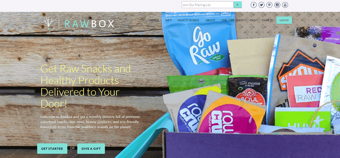 RawBox website screenshot showing a wooden background and an open box from the company. 