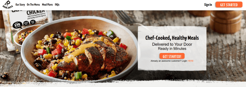 A screenshot from the RealEats website showing a chicken dish with corn and delicious ingredients