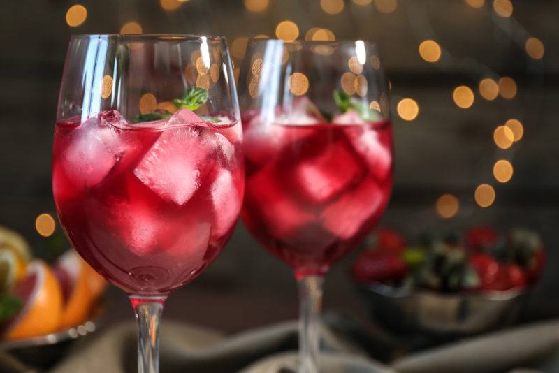 Wine glasses containing red wine spritzer