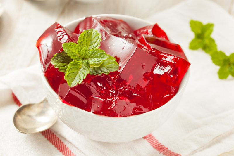 Red gelatin in a white bowl