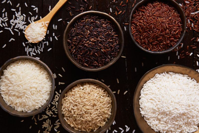 Five bowls of rice on a table