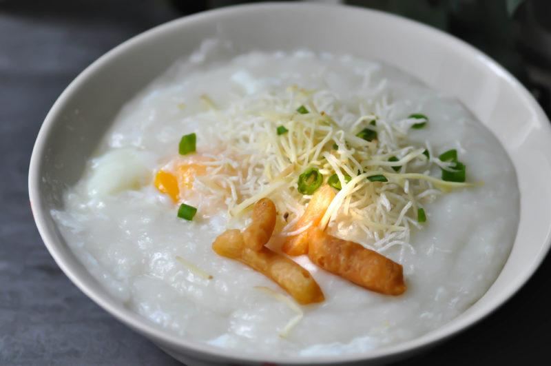 A white bowl of rice porridge