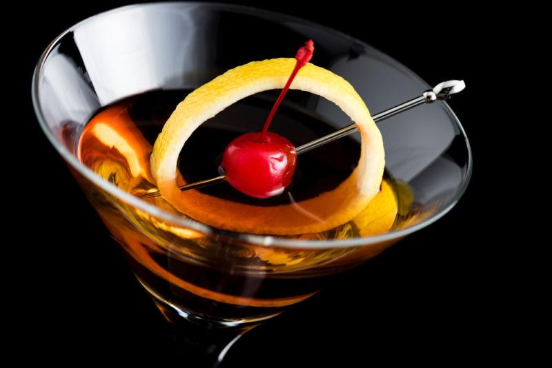 Rob Roy | Food For Net A Rob Roy cocktail with a glace cherry and orange peel