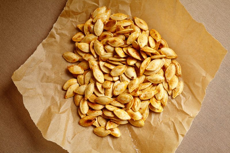 Rosted pumpkin seeds on a piece of paper