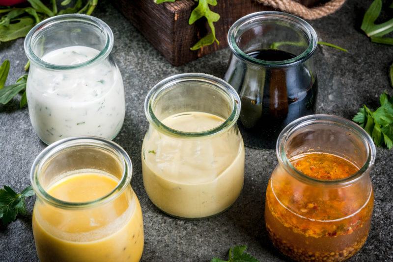 Five jars of salad dressing