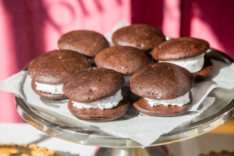 A glass plate containing fresh whoopie pies