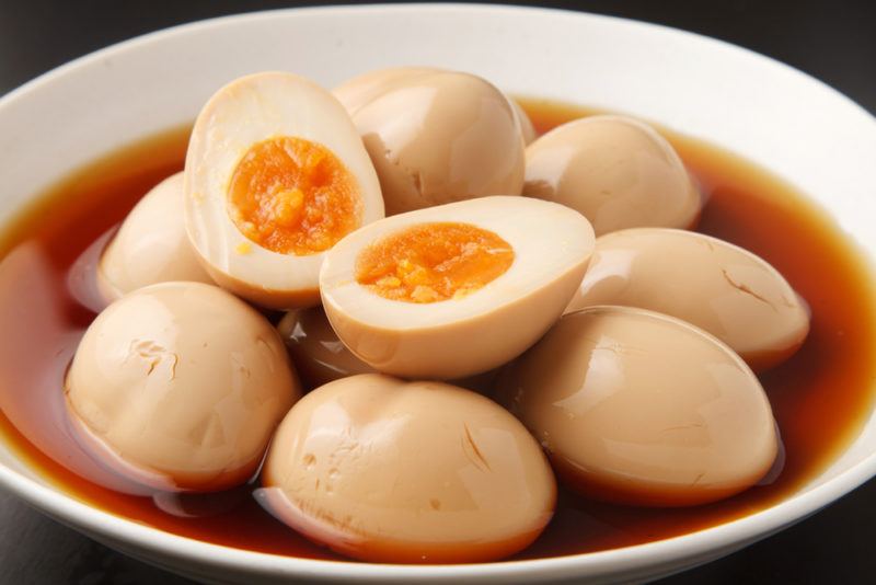 A bowl of Shoyu Tamago eggs in soy sauce