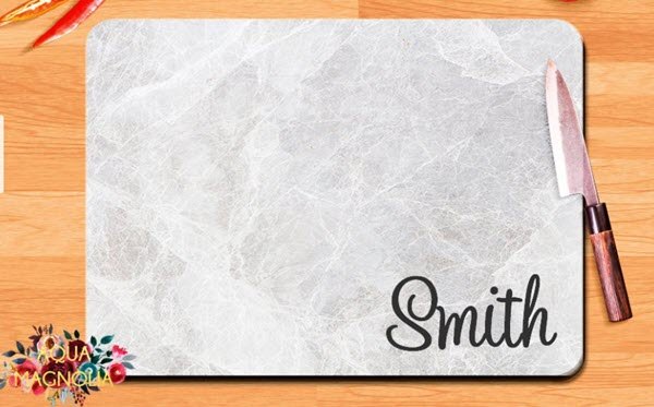 Small-Glass-Personalized-Cutting-Board | Food For Net Gray cutting board with the word Smith in the bottom right corner