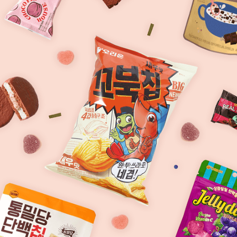 A pink background with various snacks and bags