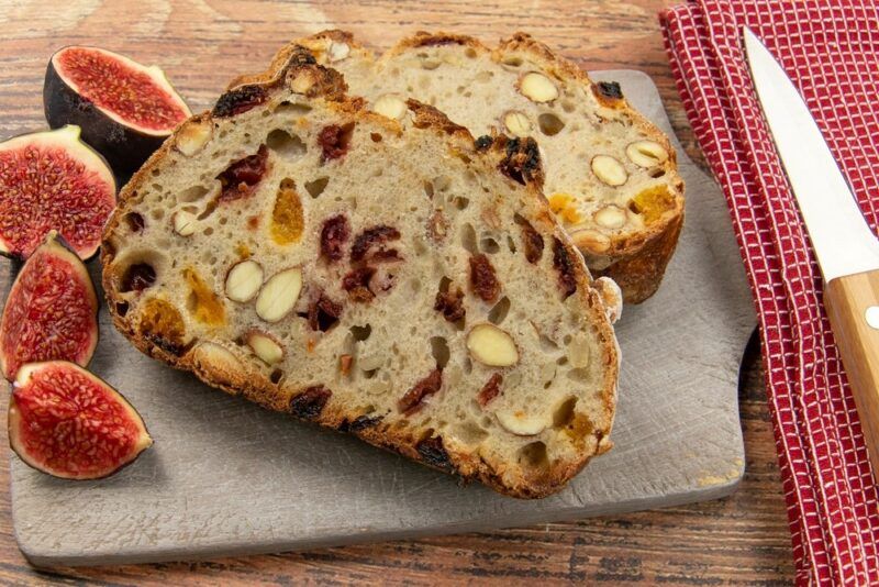 Two thick slices of fruit and nut bread