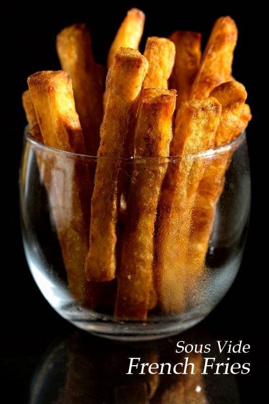 A glass containing French fries that have been cooked using sous vide