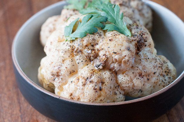 A small bowl containing cauliflower that has been cooked in sous vide