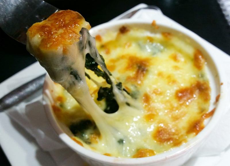 Spinach and cheese served in a ramekin