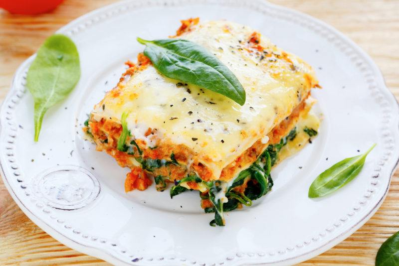 Lasagna that has been made with spinach and meat