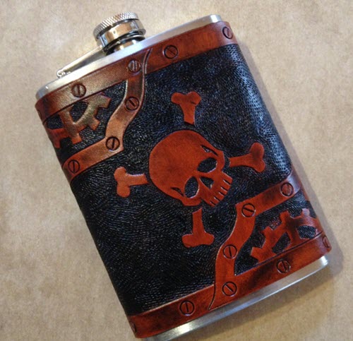 Stainless Steel Leather Covered Flask | Food For Net Stainless steel flask with leather covering and a skull