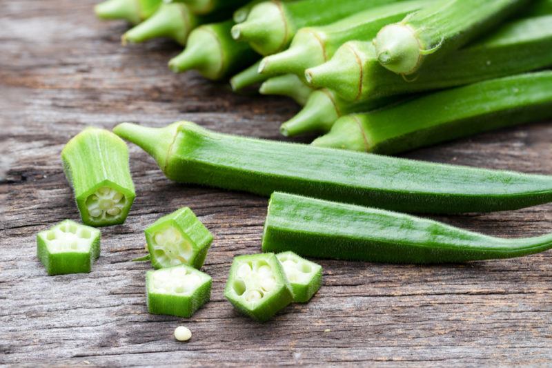 Stalks of okra, some of which have been cut