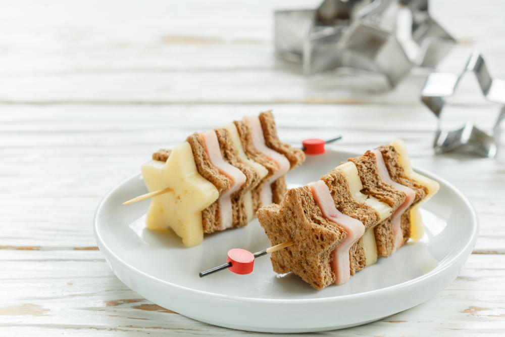 Two sandwiches shaped like stars on kebabs