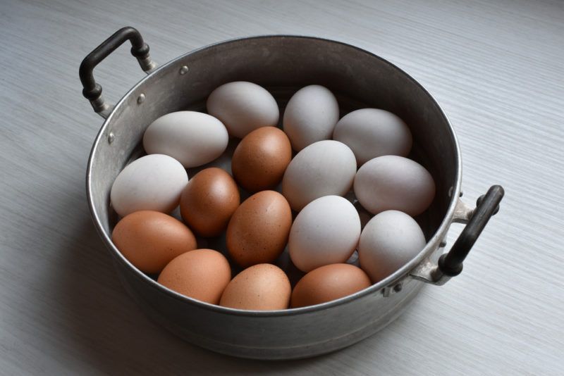 A basket of eggs in a steamer