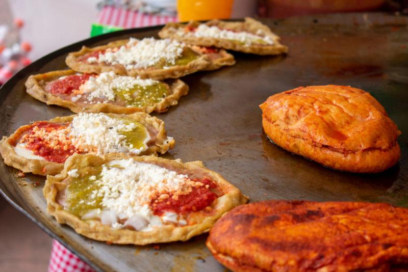 Various tortilla street meals being prepared in Mexico