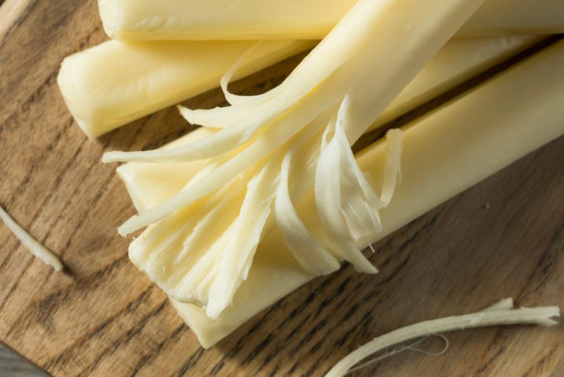 String cheese pieces on a table