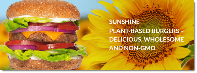 An image from the Sunshine site showing a burger made using one of their patties and a sunflower