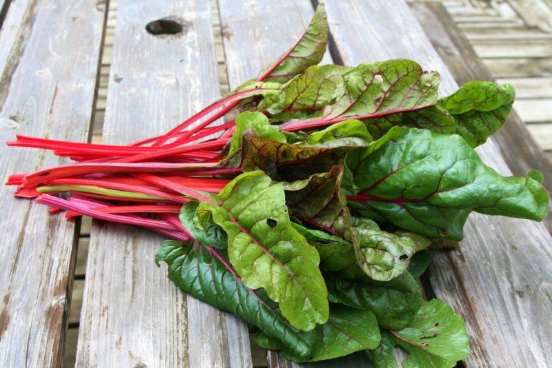 Swiss chard on a wooden table