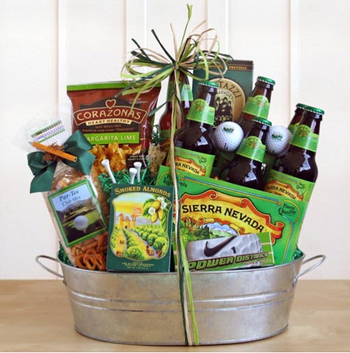 Silver tub filled with green golf-related products, including beer, snacks, golf balls and tees. 