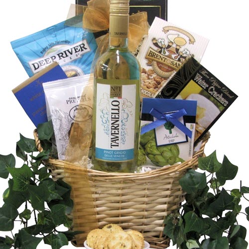 A blue and white gift basket surrounded by greenery