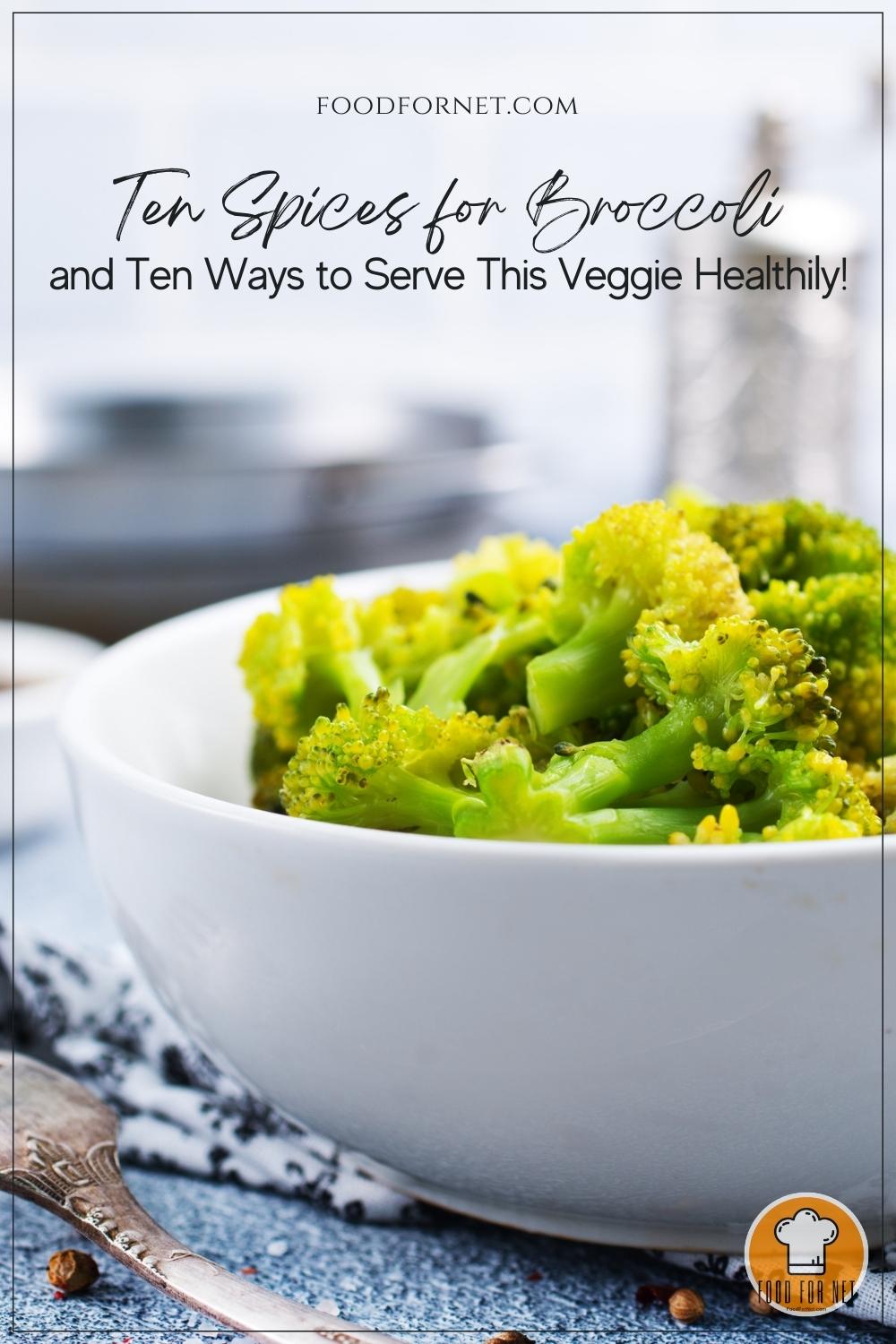 a closeup image of a white bowl full of broccoli florets, resting on a striped white and dark blue table napkin, with loose spices around it and partial image of a silver fork