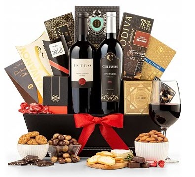 The 5th Avenue Wine Gift Basket | Food For Net A large black basket with 2 bottles of wine and various snacks