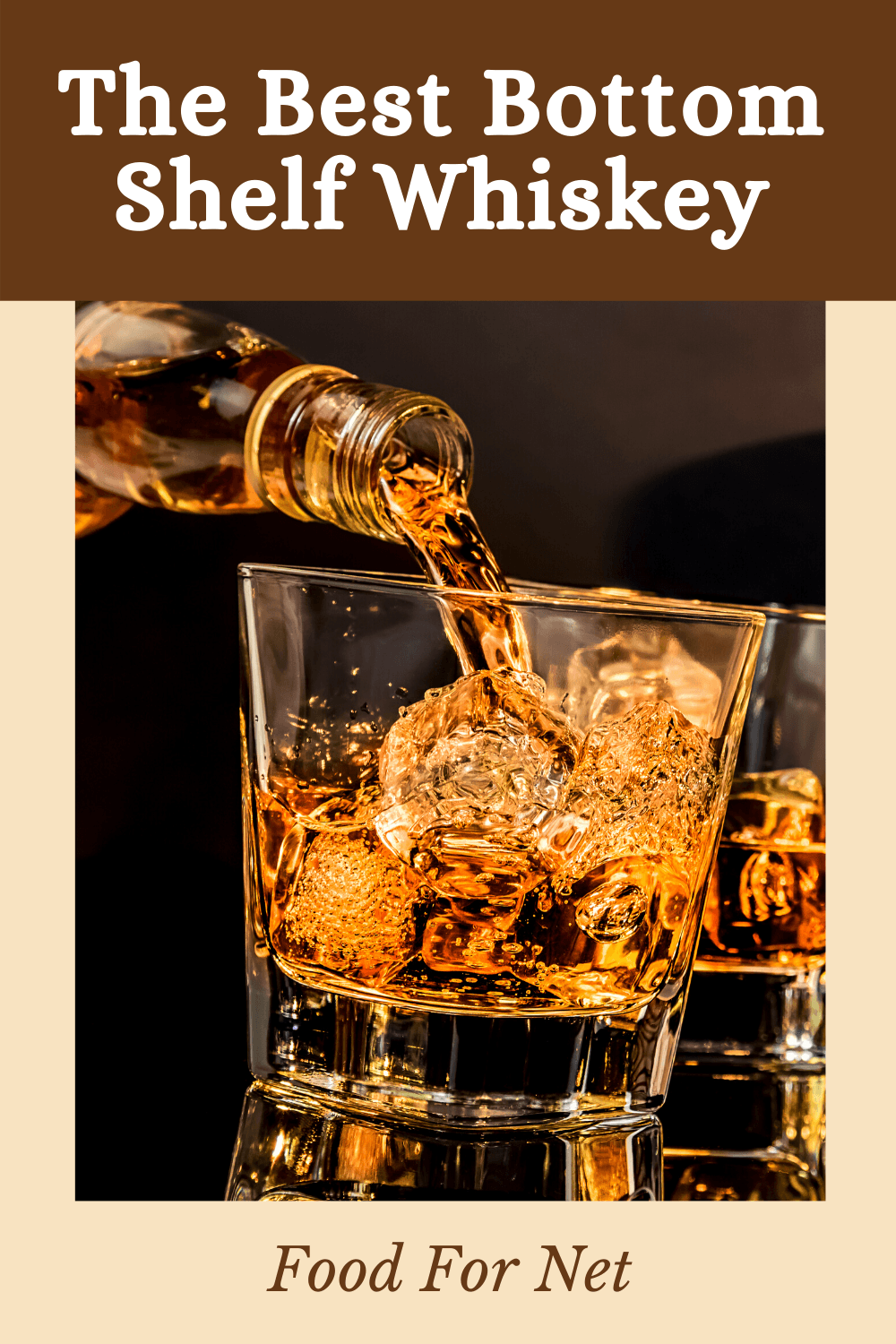 Two glasses of whiskey with ice being poured from a bottle