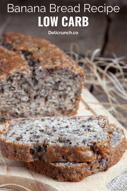 Two slices of banana bread and a loaf on a board