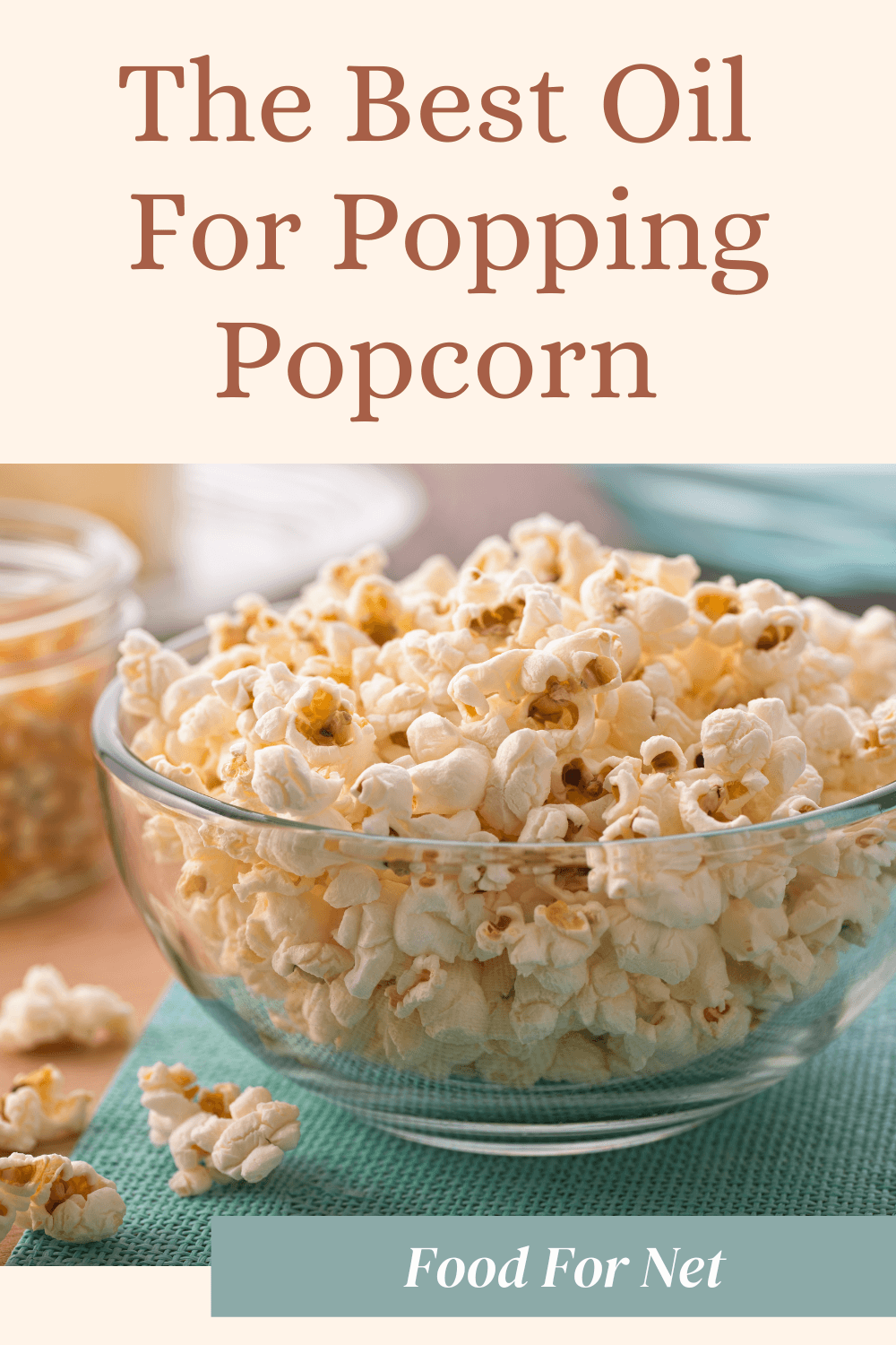 A large glass bowl filled with popcorn that has been prepared using some of the best oil for popping popcorn