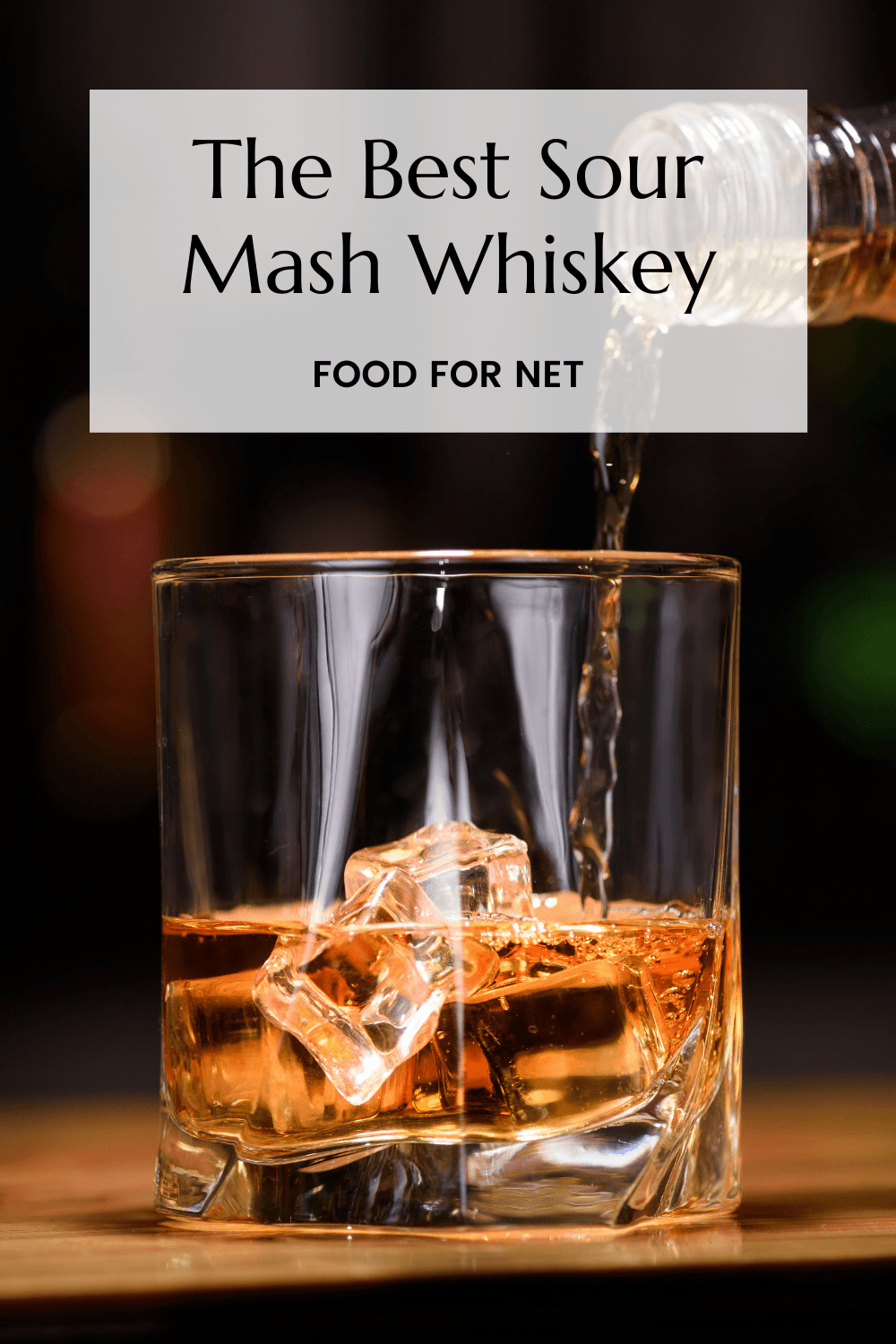 Best Sour Mash Whiskey. A glass of sour mash whiskey being poured from a bottle