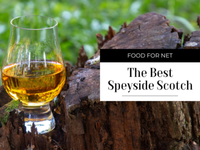 A glass of Speyside Scotch whisky on a tree stump, as an illustration of the best Speyside Scotch