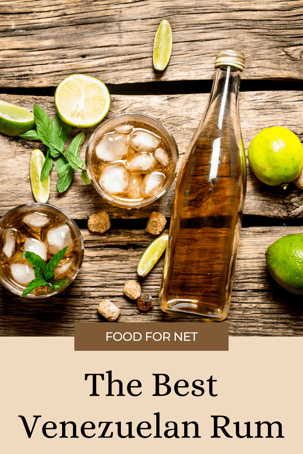 A bottle of the best Venezuelan rum on a wooden table, next to glasses of the rum with ice and some limes