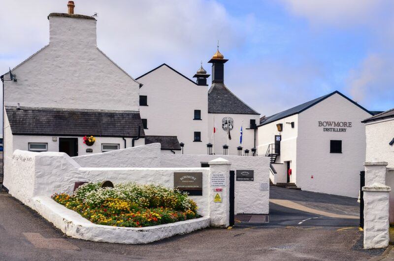 The Bowmore distillery against a cloudy sky