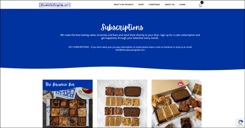 screenshot of The Cake Tasting Club Subscription Boxes' web page, mainly white page with the website's name/logo on top along with the main navigation menu, followed by a blue bar with text overlay of info regarding the different cake subscription