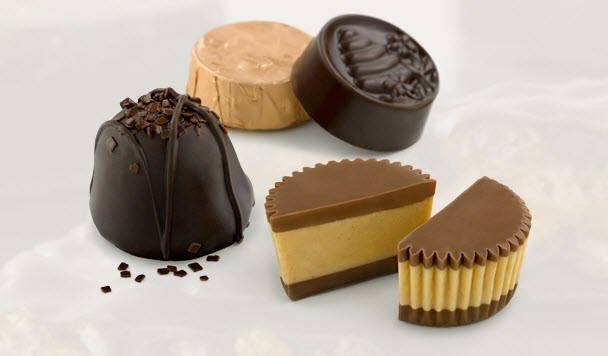 A selection of 3 unwrapped chocolates and one wrapped chocolate