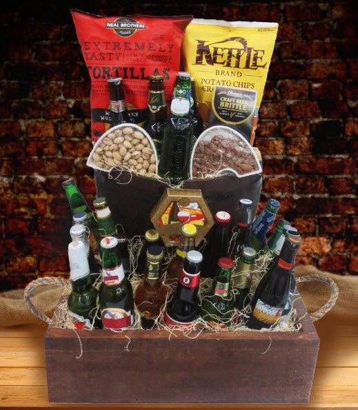 Large wooden box filled with straw, beer and snacks. 