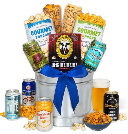 Silver bucket with various snacks and cans of beer. 