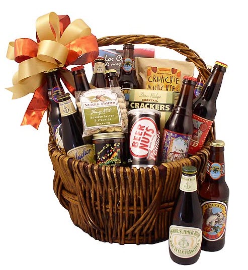 Round basket packed full of beer and snacks. 