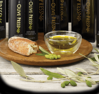 The Olive Press Clubs | Food For Net A selection of olive oil bottles and olive oil
