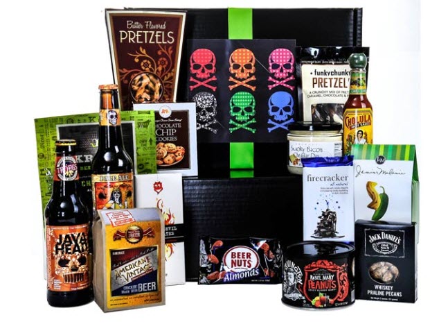 A selection of beer and snacks, along with a black box, prominently featuring skulls.