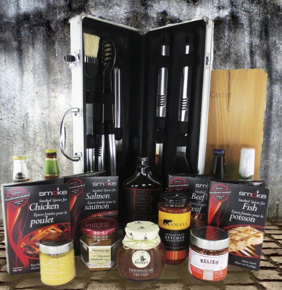 A case of BBQ tools, with sauces, spices and beer