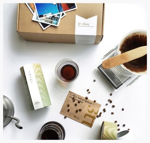 A box of coffee with various related products